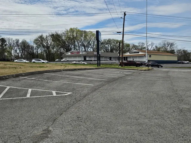 a view of a building with a road