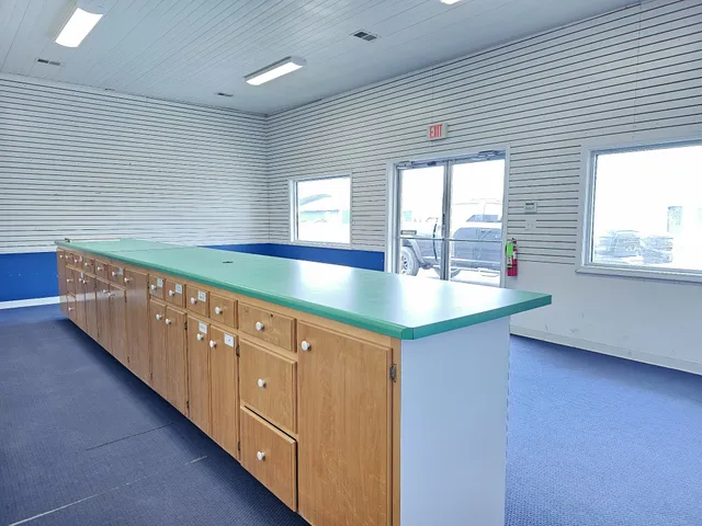 a kitchen with stainless steel appliances granite countertop a sink and a granite counter tops