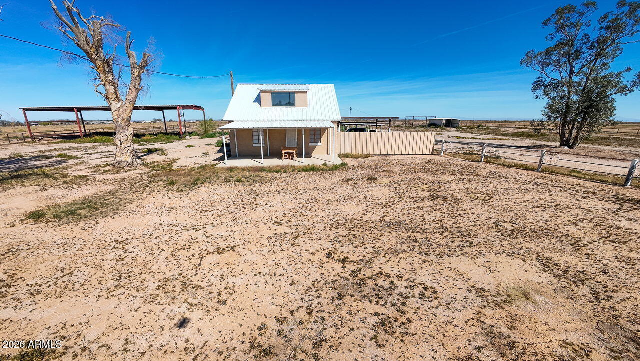 3384 East Cornman Road Casa Grande, AZ 85194 - Photo 14 of 58 a view of a house with a yard
