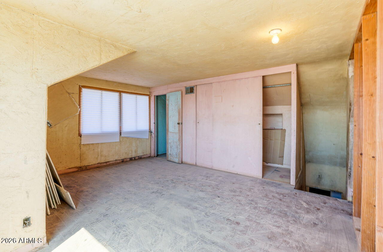 3384 East Cornman Road Casa Grande, AZ 85194 - Photo 29 of 58 an empty room with windows