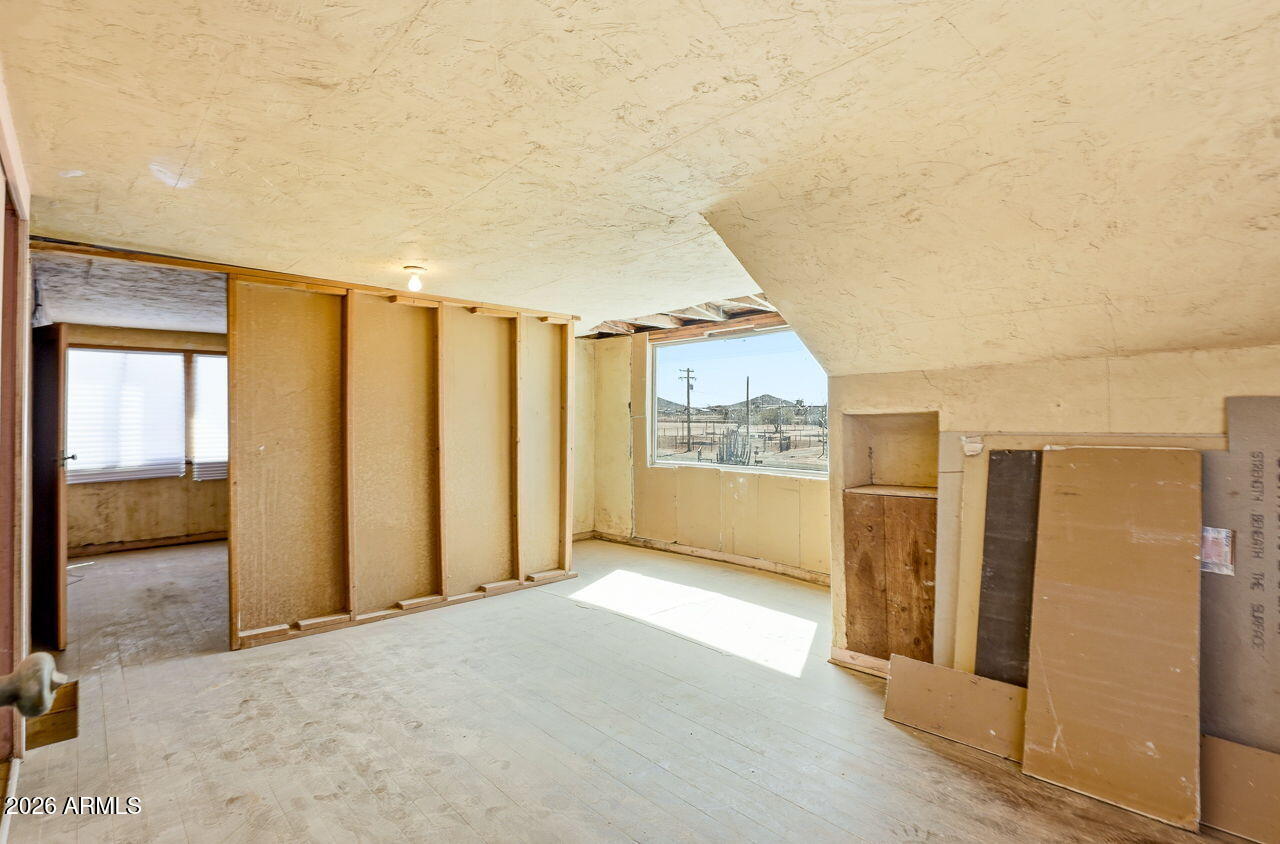 3384 East Cornman Road Casa Grande, AZ 85194 - Photo 30 of 58 an empty room with windows
