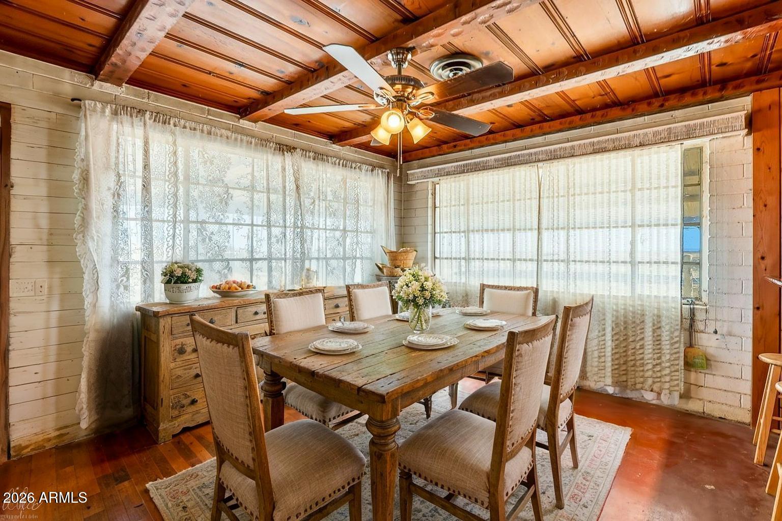 3384 East Cornman Road Casa Grande, AZ 85194 - Photo 35 of 58 a view of a dining room with furniture window and outside view