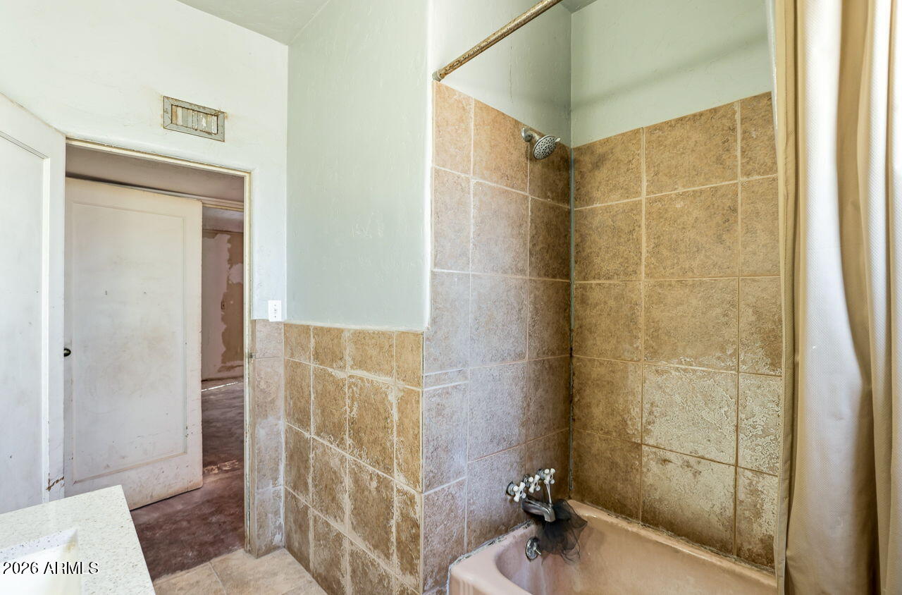 3384 East Cornman Road Casa Grande, AZ 85194 - Photo 43 of 58 a bathroom with a shower