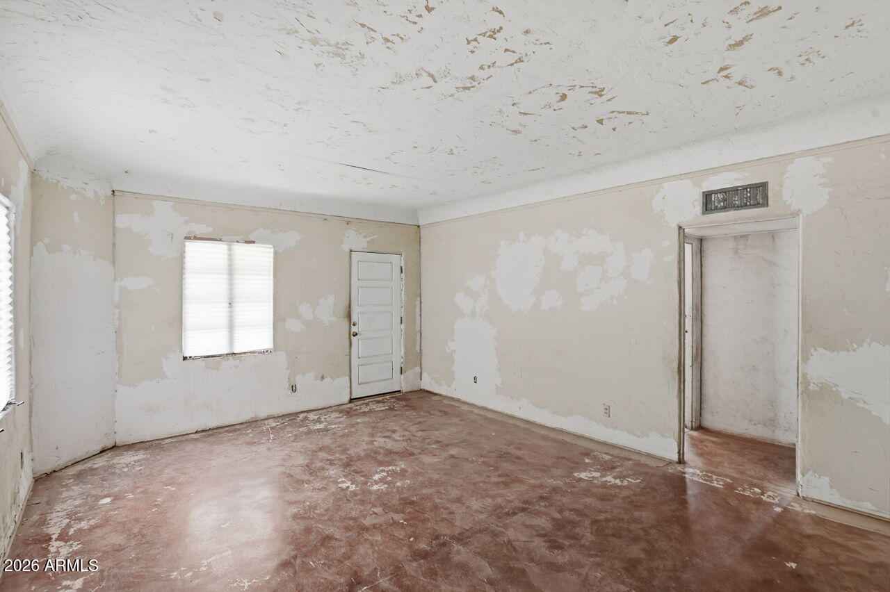 3384 East Cornman Road Casa Grande, AZ 85194 - Photo 49 of 58 a view of an empty room with a window