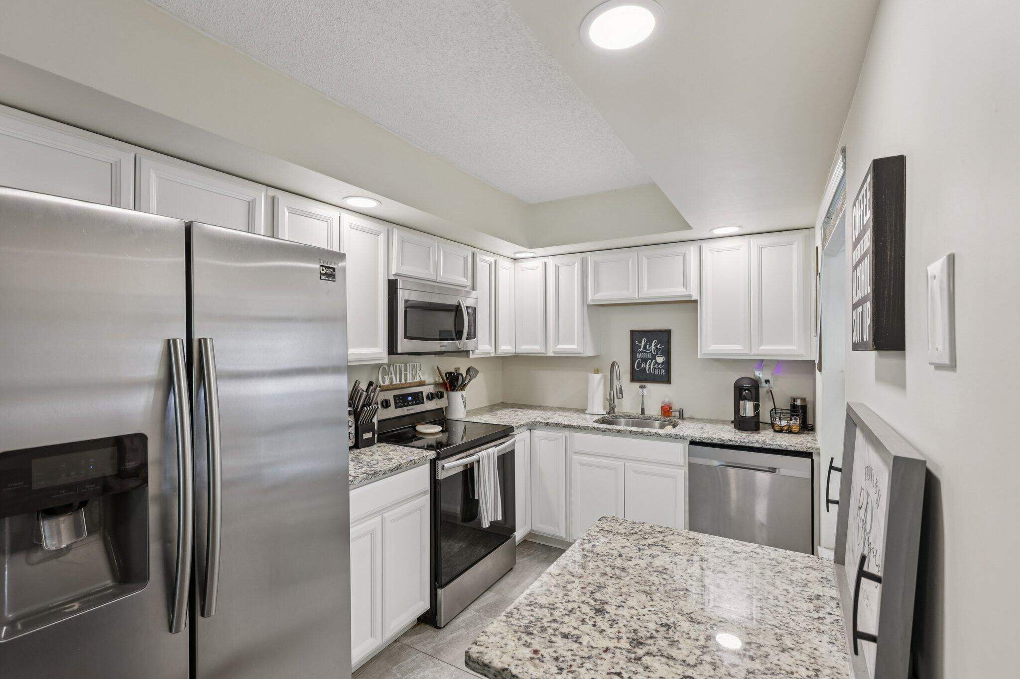 301 Olivewood Place, Unit 130 Boca Raton, FL 33431 - Photo 2 of 72 49-web-or-mls-- 301 Olivewood Pl o130-S1