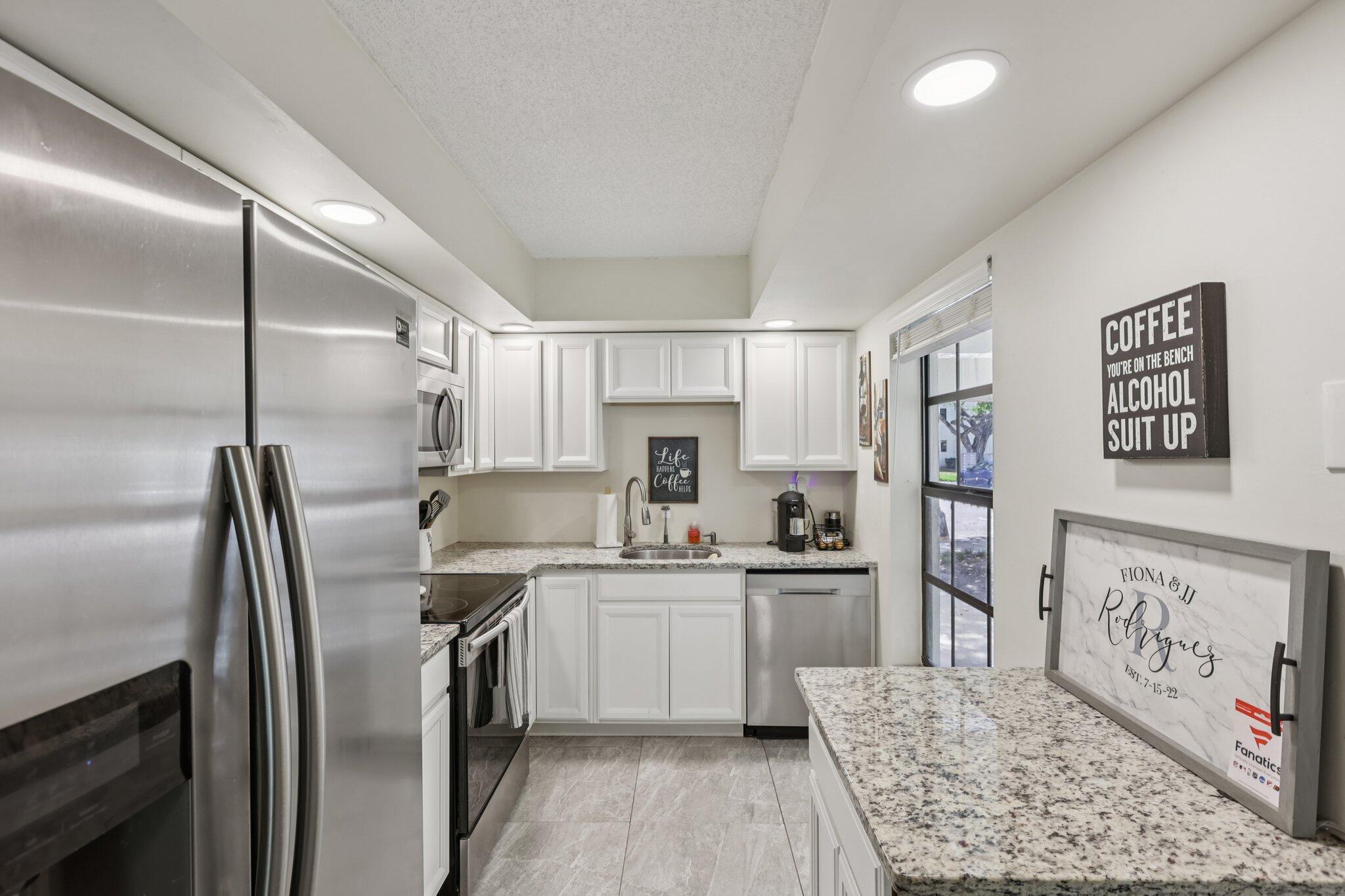 301 Olivewood Place, Unit 130 Boca Raton, FL 33431 - Photo 3 of 72 50-web-or-mls-- 301 Olivewood Pl o130-S1