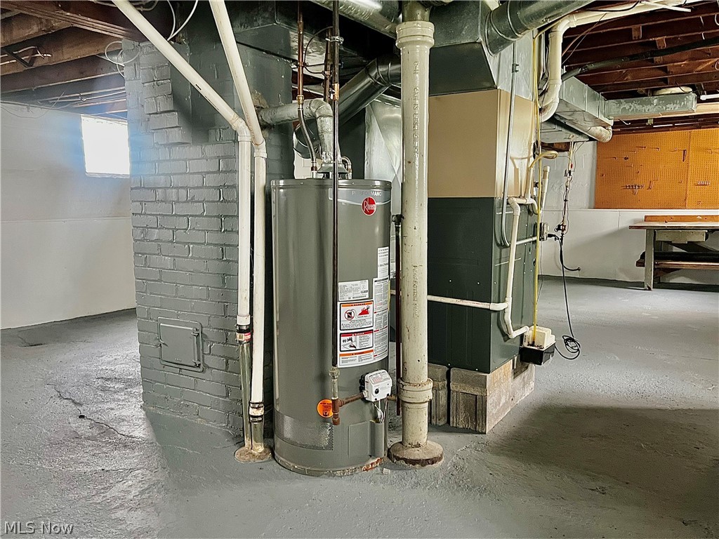 67 Forbes Road Bedford, OH 44146 - Photo 17 of 20 Utilities with water heater