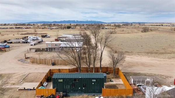 a view of a lake with a building in the background