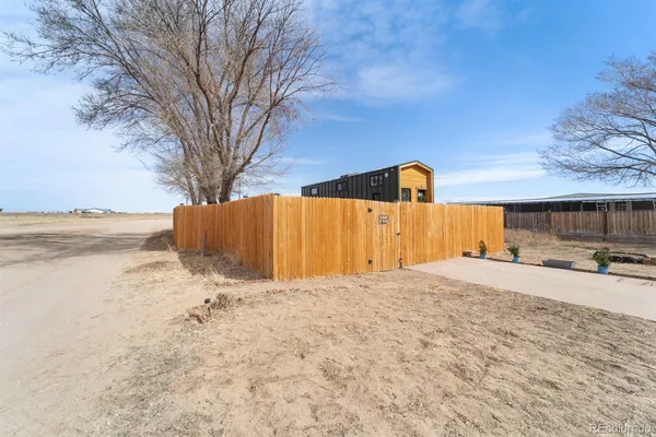 a view of a large parking space near a yard
