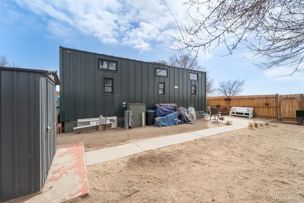 a view of a backyard with a patio