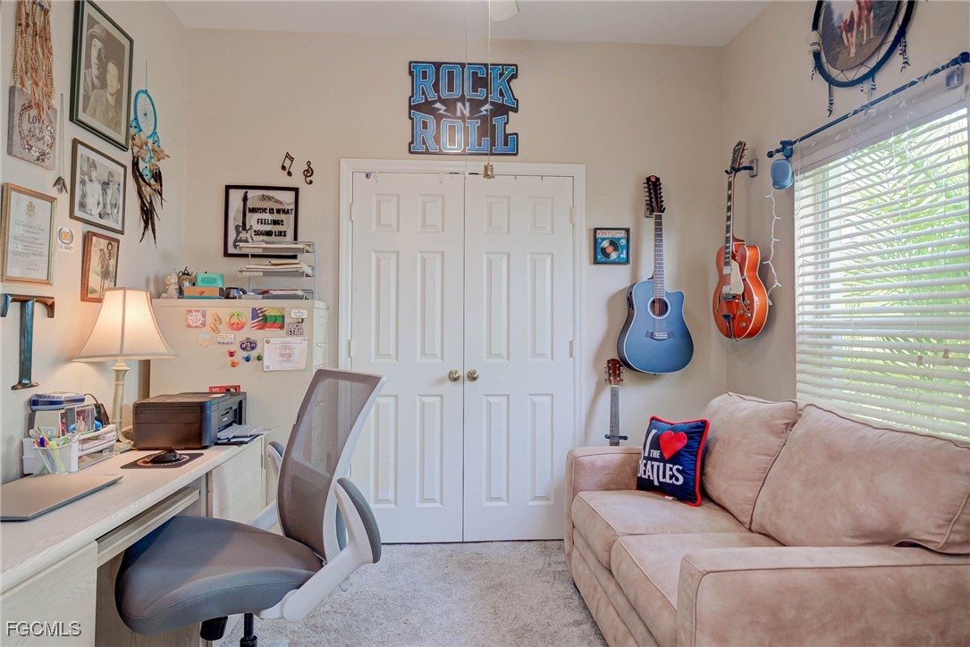 9005 Falcon Pointe Loop Fort Myers, FL 33912 - Photo 18 of 39 a living room with furniture and a window