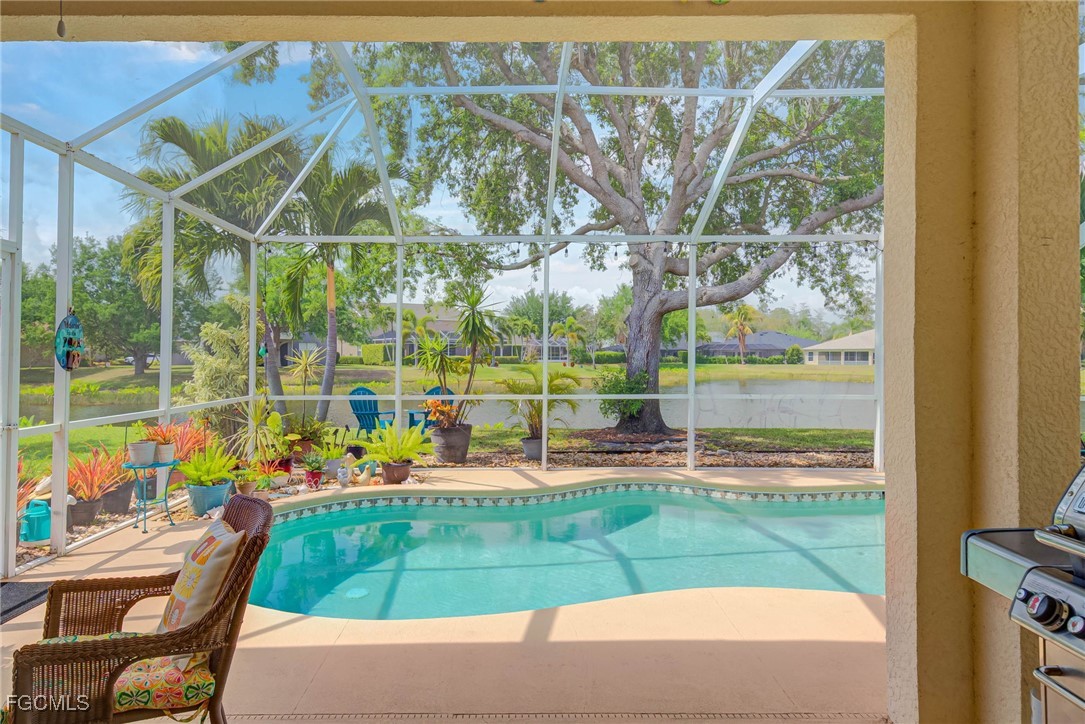 9005 Falcon Pointe Loop Fort Myers, FL 33912 - Photo 24 of 39 a view of yard with an outdoor seating
