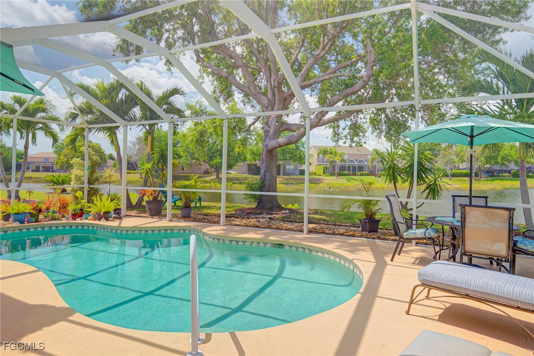 9005 Falcon Pointe Loop Fort Myers, FL 33912 - Photo 25 of 39 a view of a swimming pool with a patio