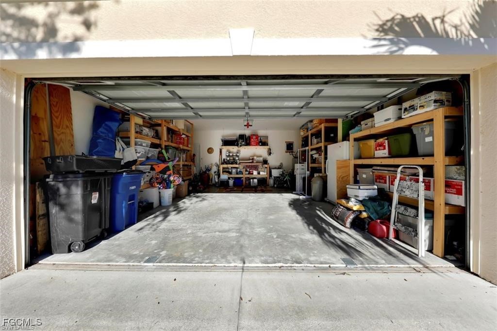 9005 Falcon Pointe Loop Fort Myers, FL 33912 - Photo 28 of 39 a view of a storage room with a lot of stuff