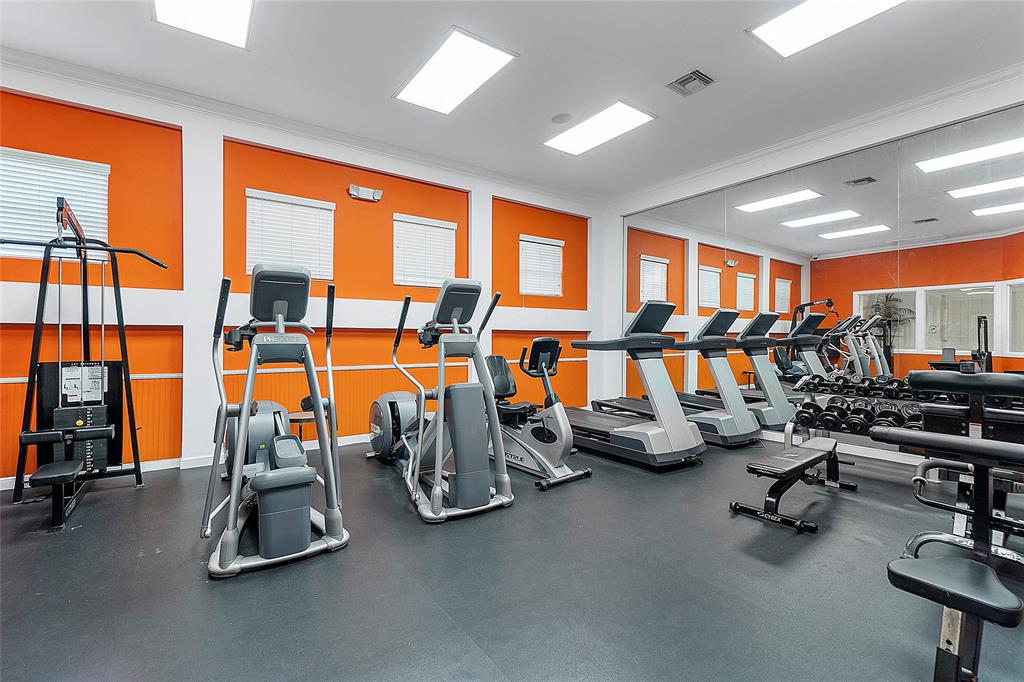 6020 West Sample Road, Unit 103 Coral Springs, FL 33067 - Photo 17 of 20 a view of a room with gym equipment