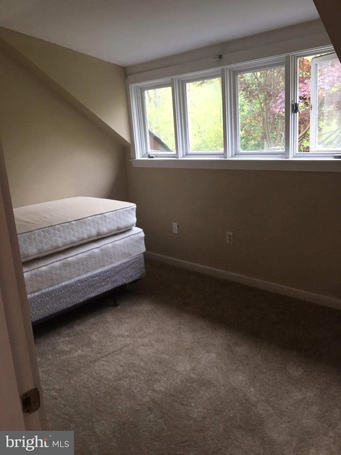 12466 Dalton Trail Lusby, MD 20657 - Photo 31 of 74 a room with a bed and a window