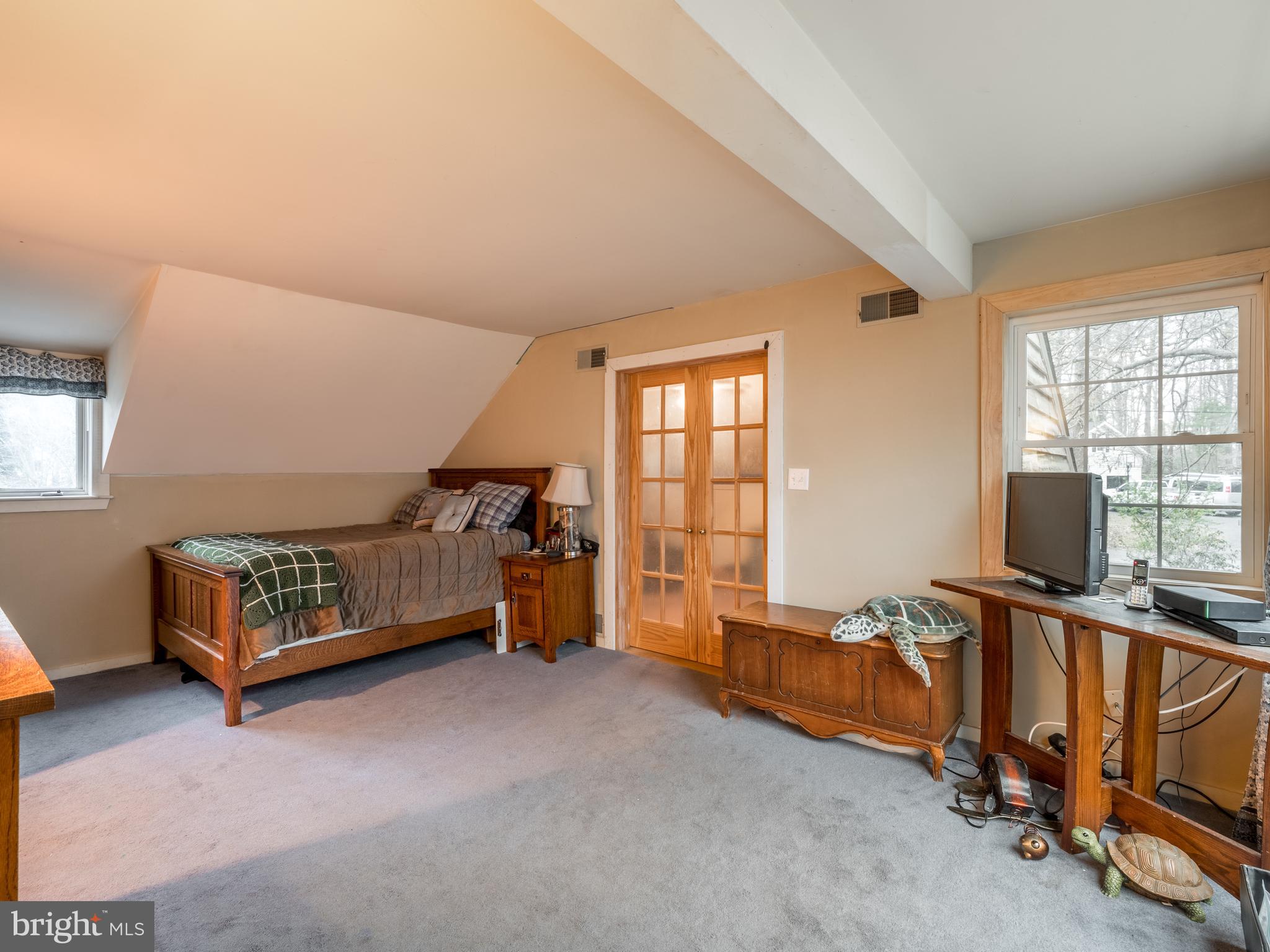 12466 Dalton Trail Lusby, MD 20657 - Photo 36 of 74 a bedroom with furniture and a window