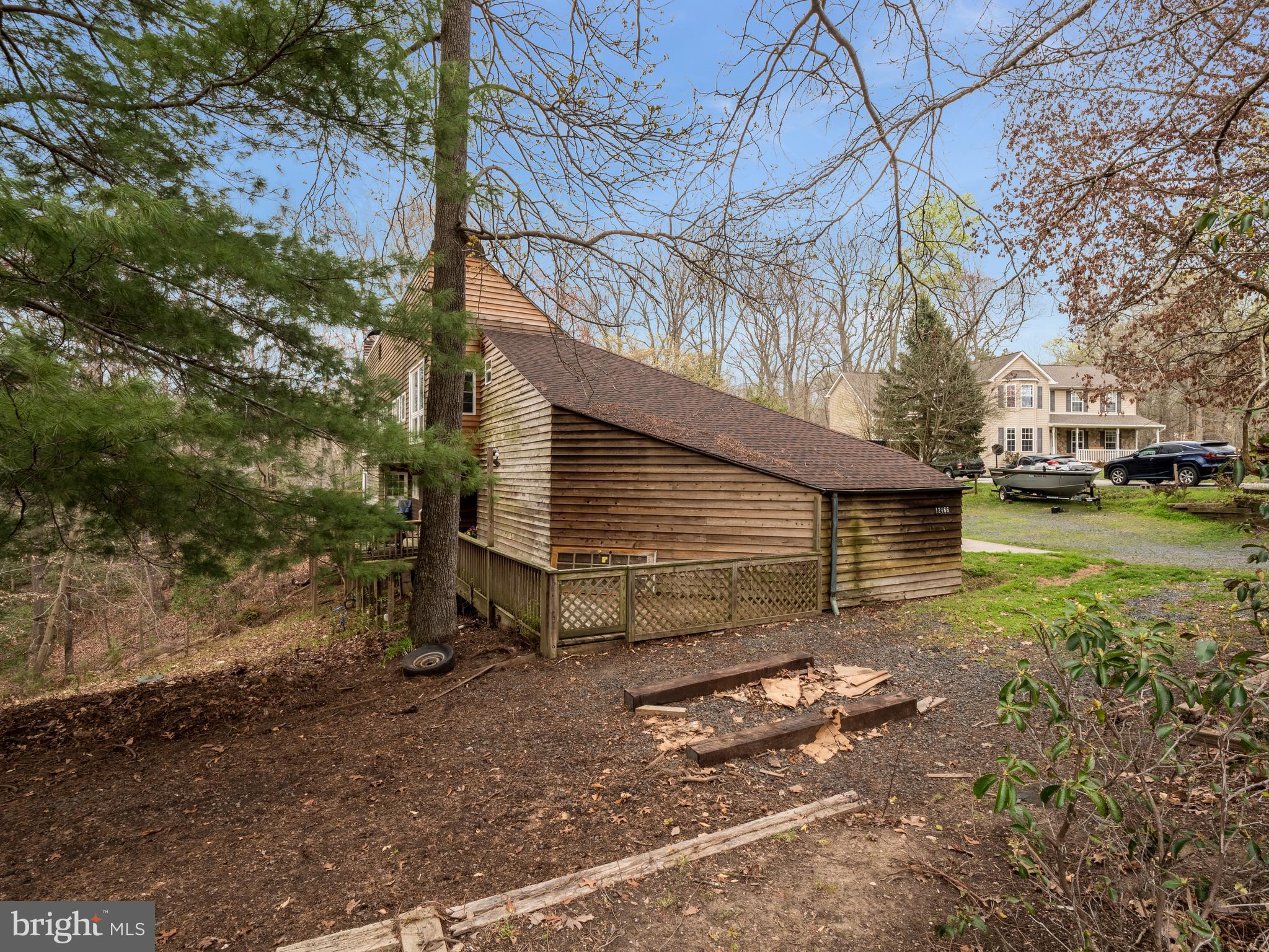 12466 Dalton Trail Lusby, MD 20657 - Photo 4 of 74 a view of a house with a yard