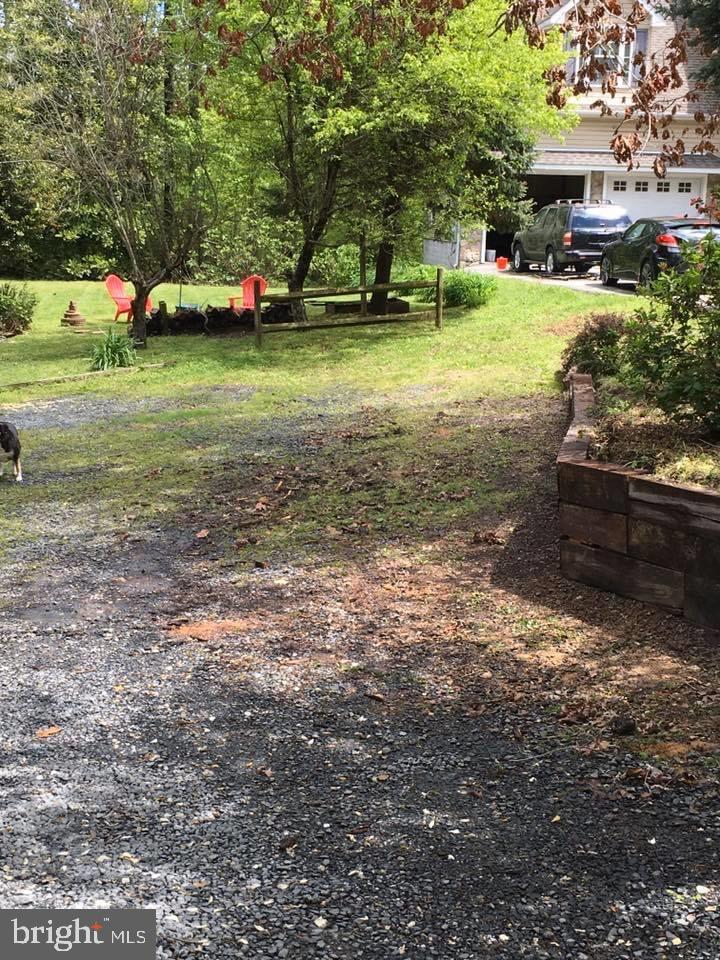 12466 Dalton Trail Lusby, MD 20657 - Photo 48 of 74 a view of a park with large trees