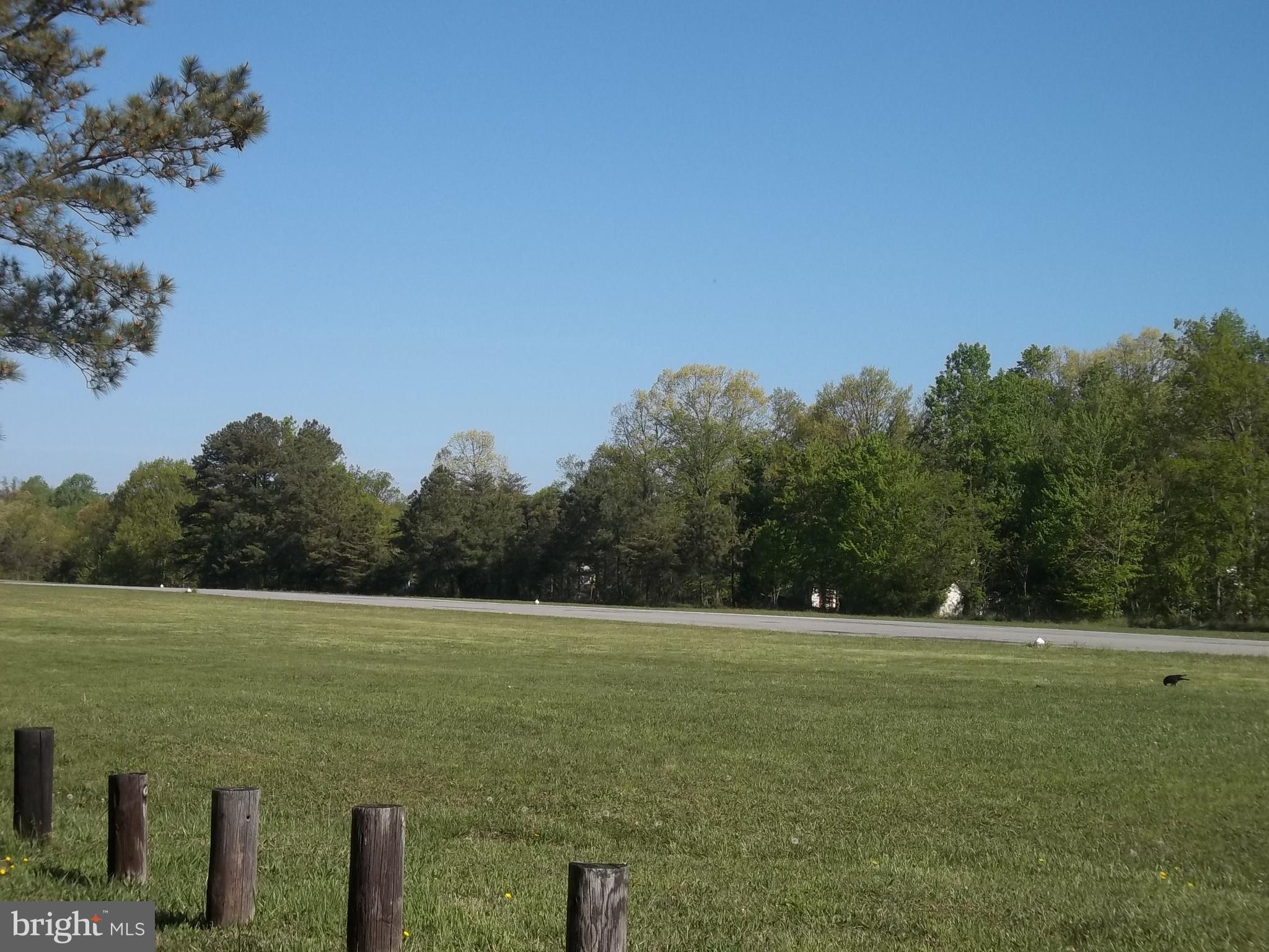 12466 Dalton Trail Lusby, MD 20657 - Photo 64 of 74 a view of a field with an ocean