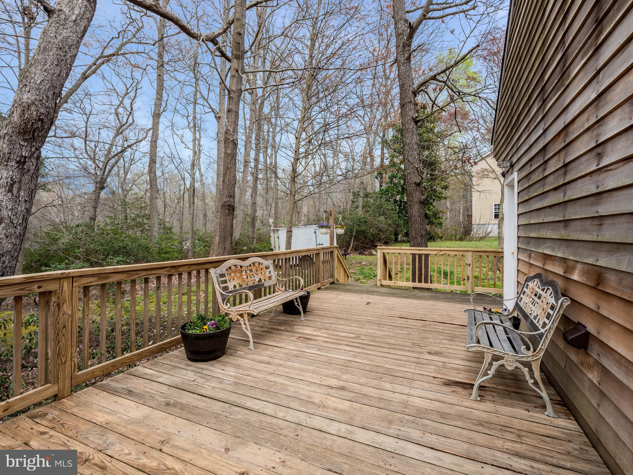 12466 Dalton Trail Lusby, MD 20657 - Photo 10 of 74 a view of deck with furniture and trees