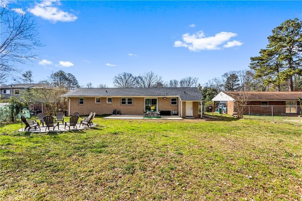 1646 Flicker Road Hampton, GA 30228 - Photo 6 of 38 a view of a house with a yard