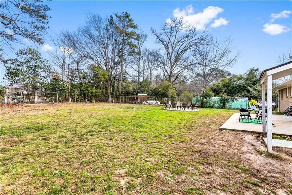 1646 Flicker Road Hampton, GA 30228 - Photo 8 of 38 a view of swimming pool with sitting area
