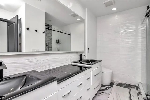 a view of a city with tall buildings