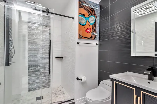 a view of swimming pool with outdoor seating and plants