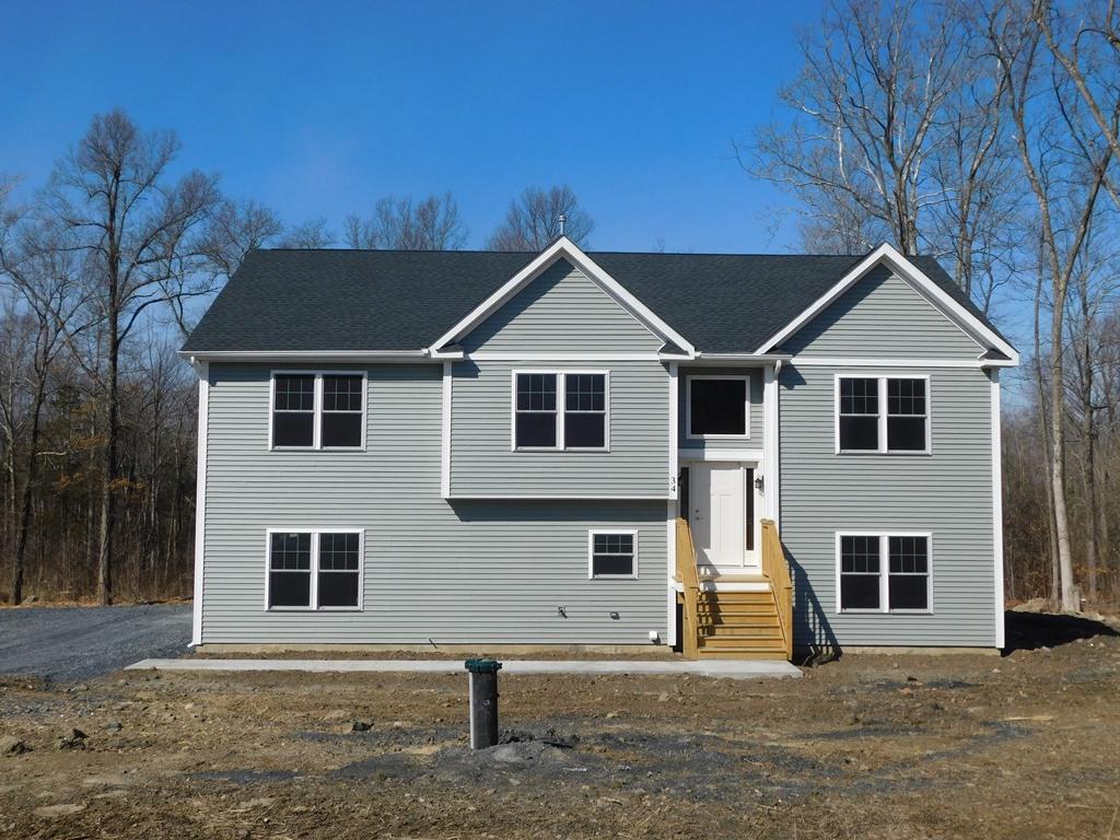 34 Emily Drive Wallkill, NY 12589 - Photo 1 of 1 a front view of a house with garage