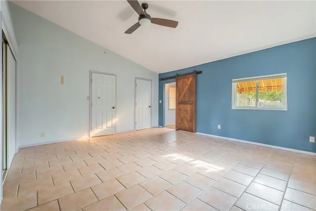 a view of empty room with windows