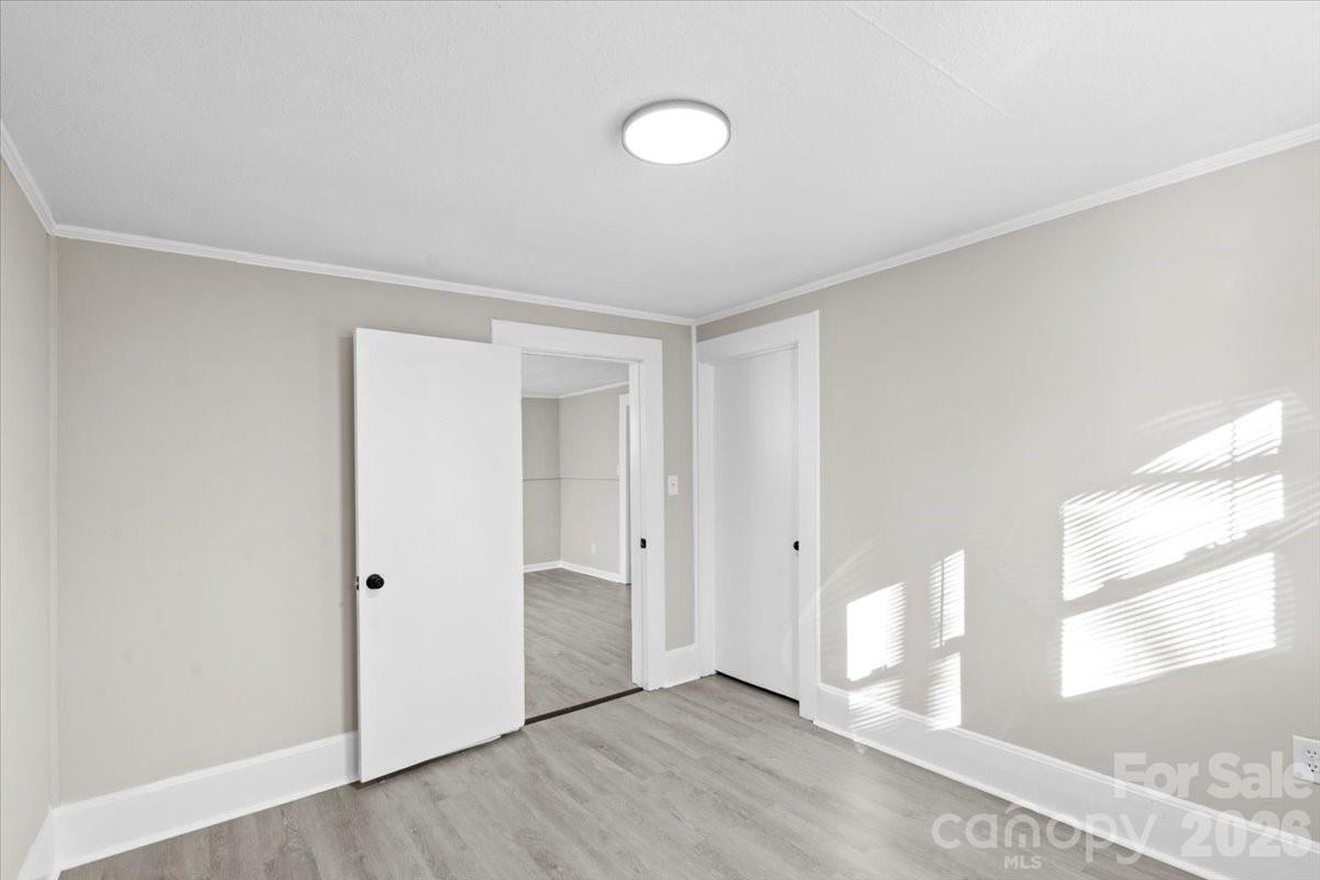 2217 Old Shelby Road Hickory, NC 28602 - Photo 16 of 20 a view of an empty room with a window