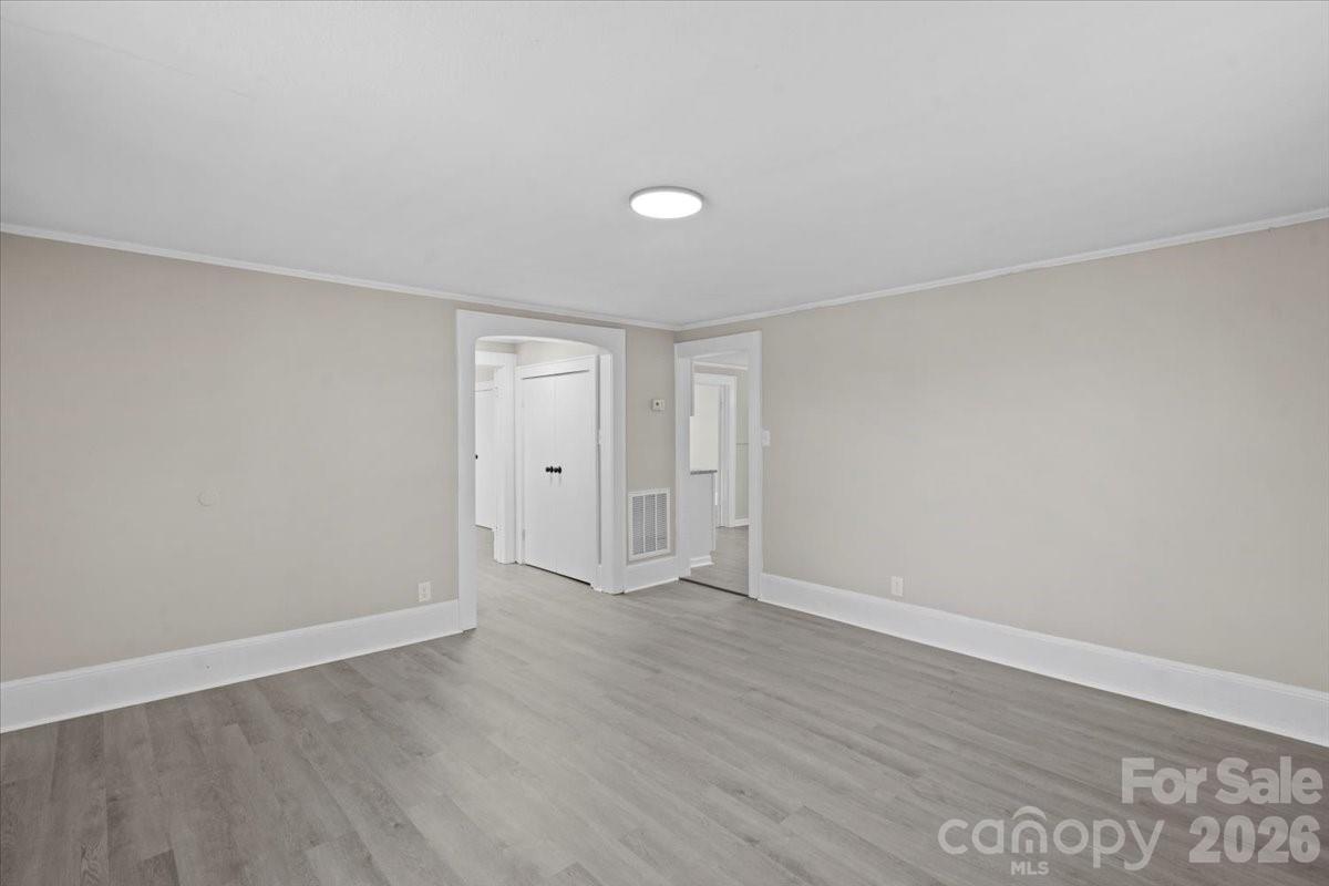 2217 Old Shelby Road Hickory, NC 28602 - Photo 5 of 20 a view of an empty room with wooden floor