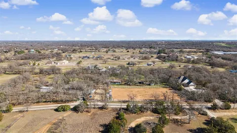 an aerial view of residential building and parking space