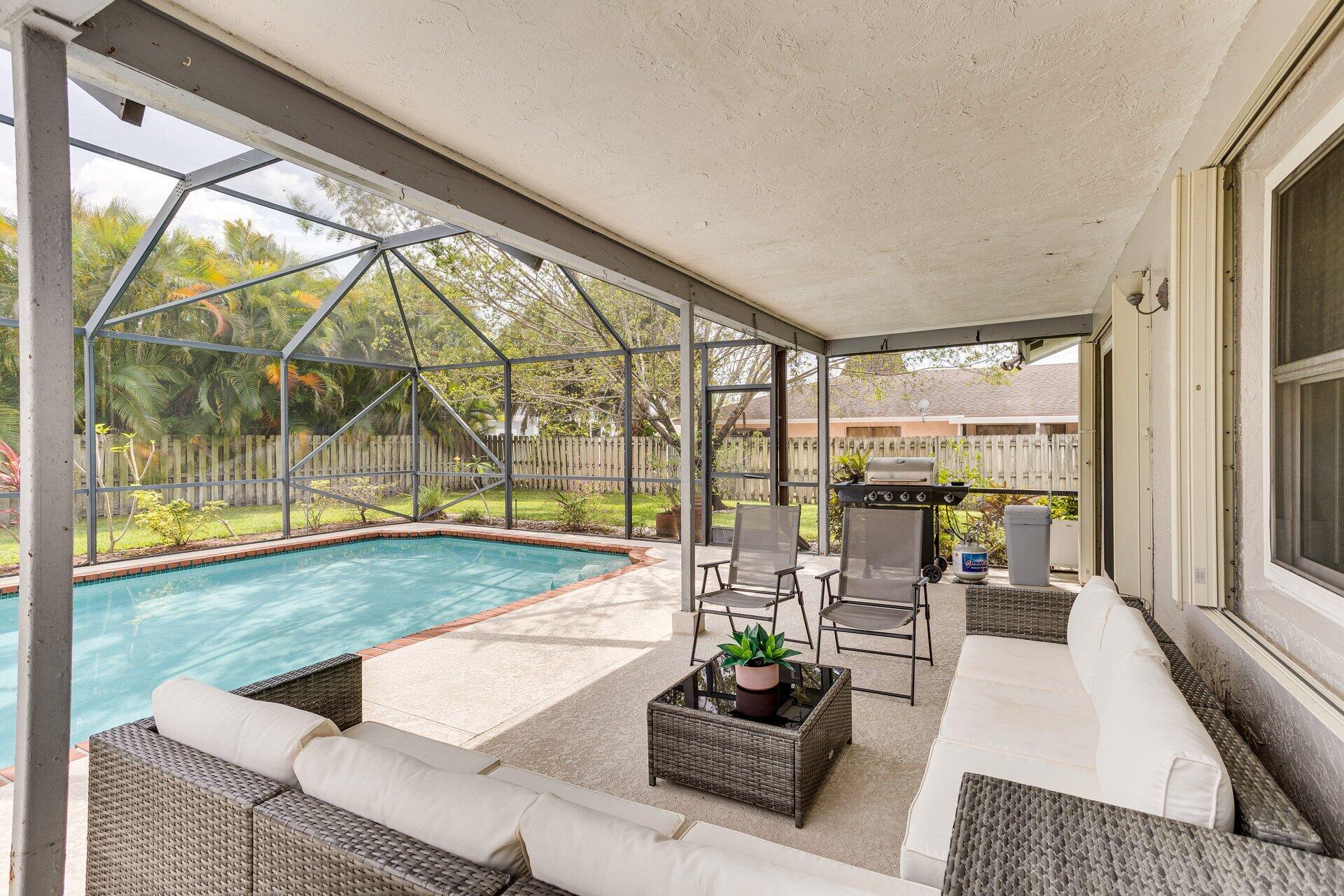 1740 Shower Tree Way Wellington, FL 33414 - Photo 20 of 22 Back Patio