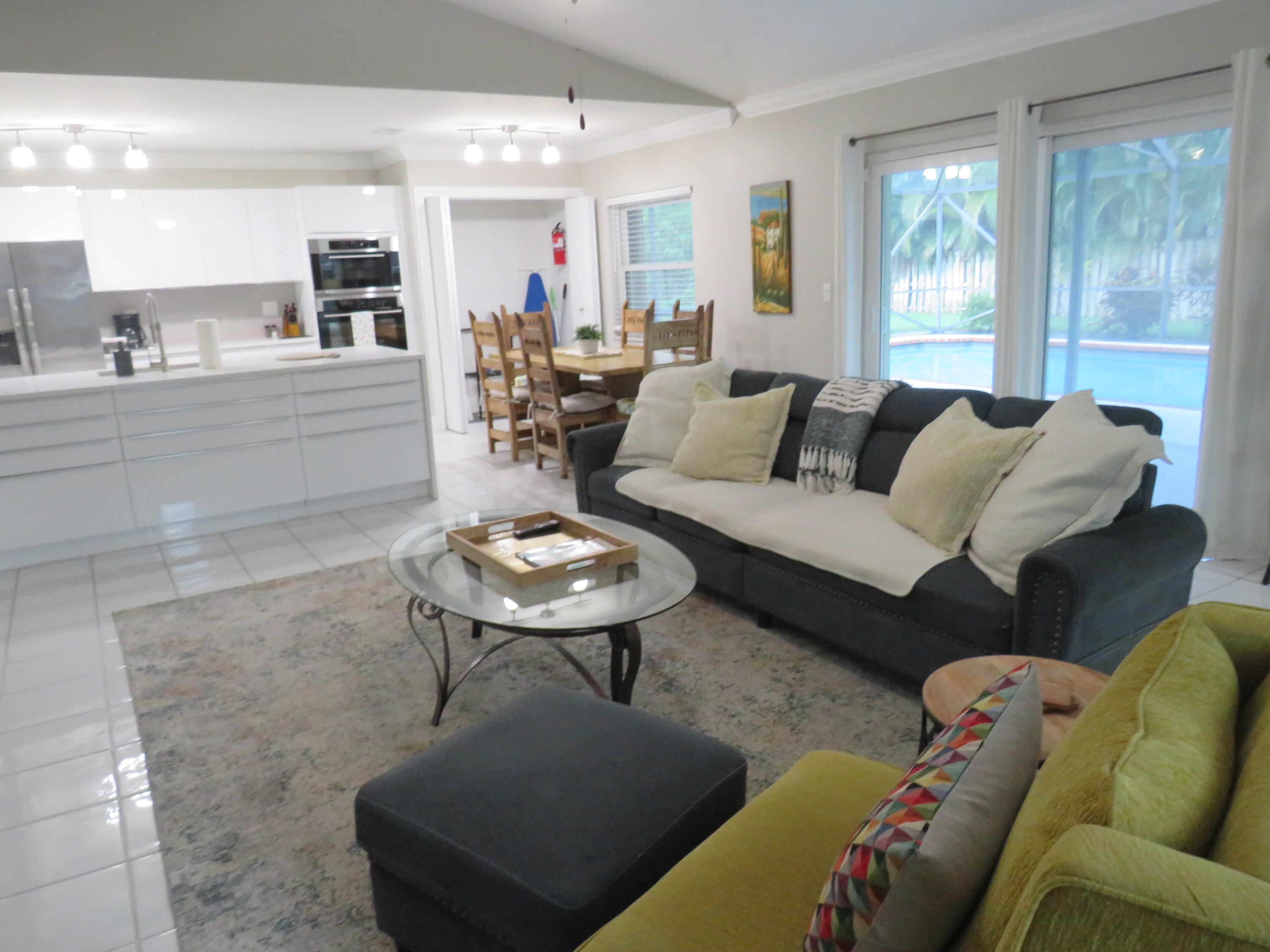 1740 Shower Tree Way Wellington, FL 33414 - Photo 4 of 22 Living,Kitchen and Dining