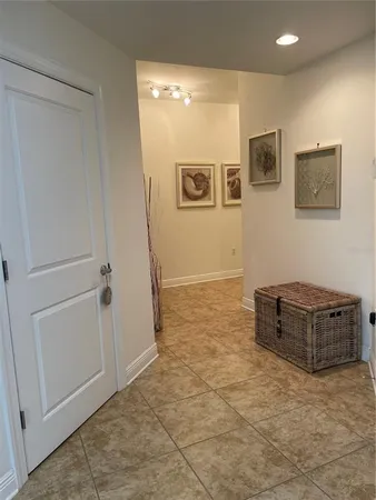 a room with furniture and mirror