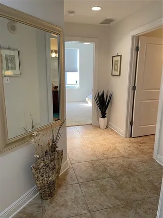 a view of entryway with livingroom