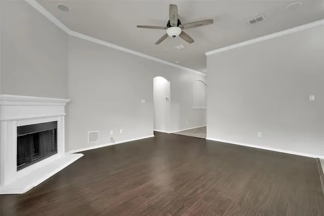 a kitchen with stainless steel appliances granite countertop a sink counter space cabinets and a stove