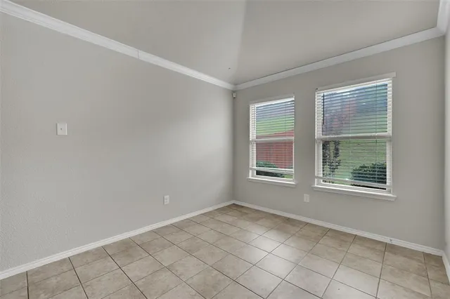a kitchen with stainless steel appliances a sink a stove a refrigerator and cabinets