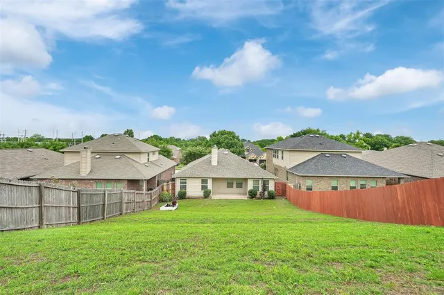 a view of a house with a garden