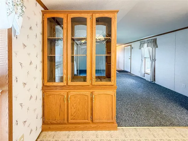 a view of an empty room and window