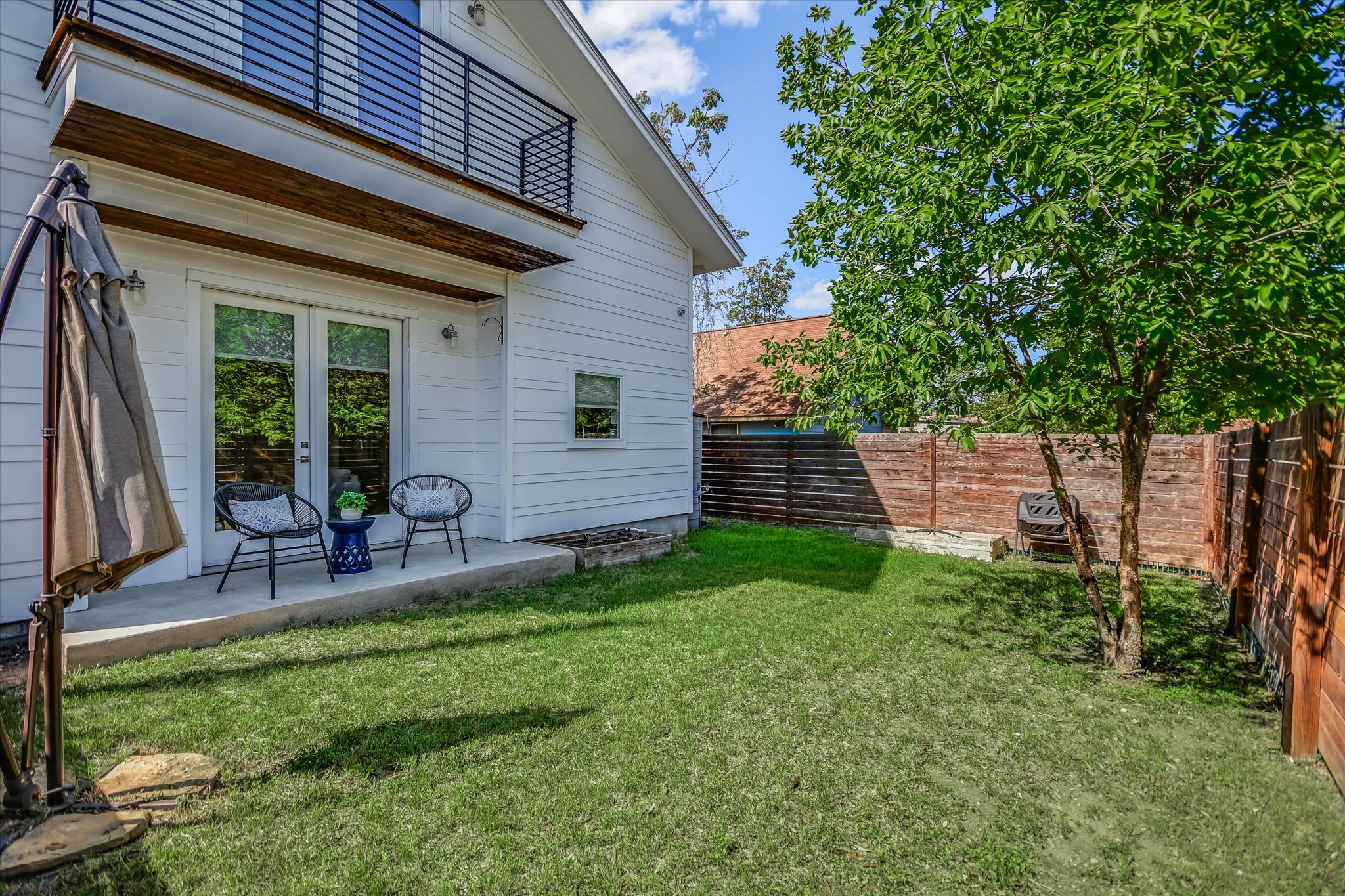 1131 Mason Avenue, Unit A Austin, TX 78721 - Photo 22 of 24 a house view with a garden space
