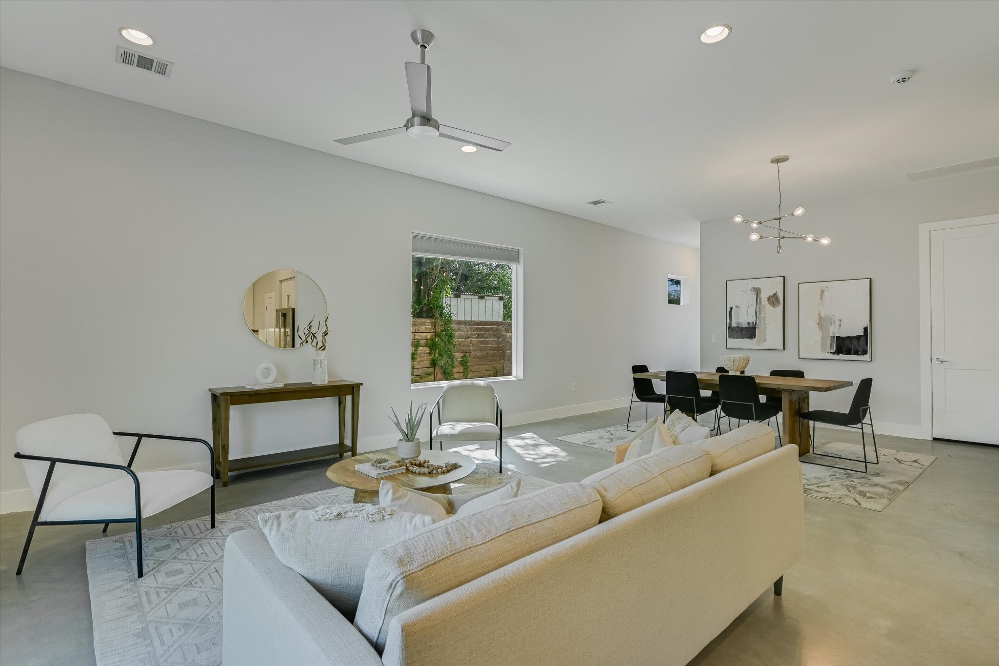1131 Mason Avenue, Unit A Austin, TX 78721 - Photo 7 of 24 a living room with furniture and a wooden floor