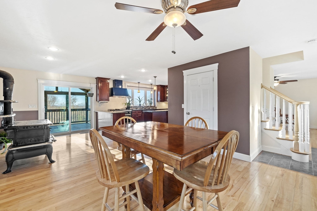 358 Reed Road Mason, NH 03048 - Photo 13 of 42 a dining room with furniture and window