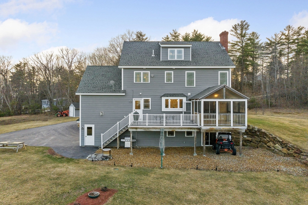 358 Reed Road Mason, NH 03048 - Photo 3 of 42 a view of a big yard in front of house