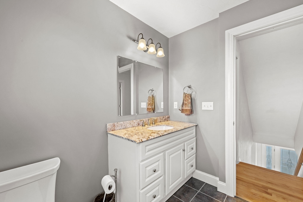 358 Reed Road Mason, NH 03048 - Photo 35 of 42 a bathroom with a sink a vanity and a mirror