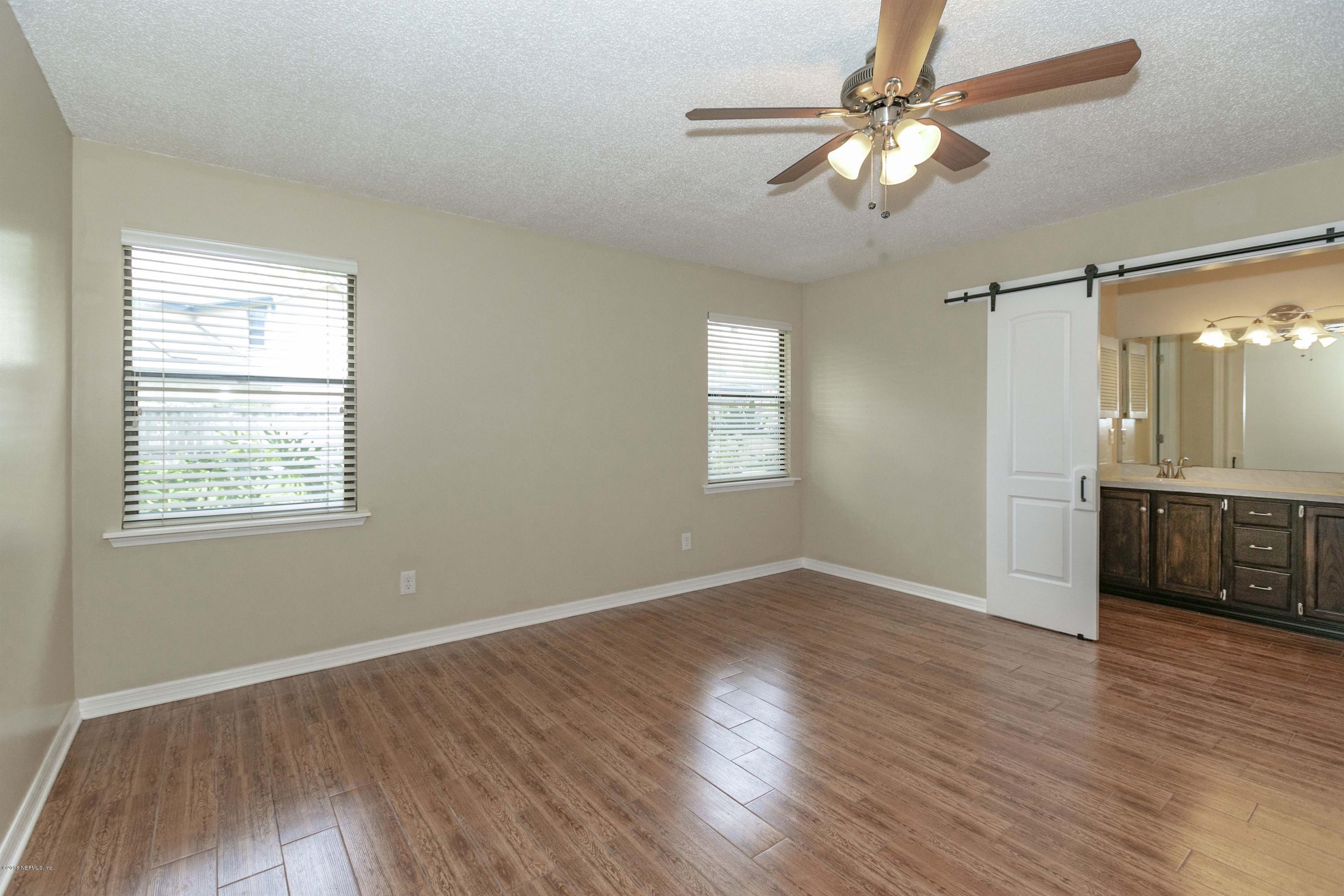8143 Crosswind Road Jacksonville, FL 32244 - Photo 9 of 20 006_Master Bedroom