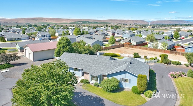 8970 Postma Road Moxee, WA 98936 - Photo 1 of 31 an aerial view of residential houses with outdoor space and trees