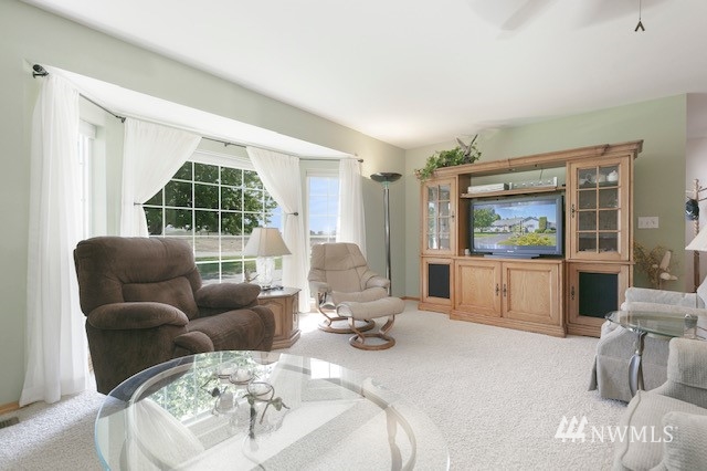 8970 Postma Road Moxee, WA 98936 - Photo 12 of 31 a living room with furniture and a large window